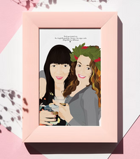 Custom illustrated portrait of two women celebrating, framed in a pink CostanzaToniniDesign frame.