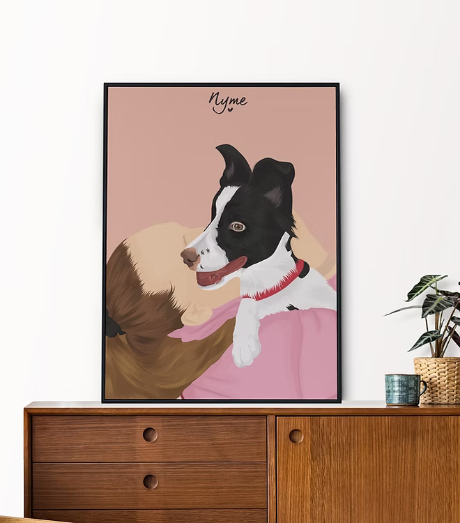 Custom pet portrait of a black and white dog named Nyme in modern frame on wood cabinet