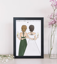 Framed CostanzaToniniDesign print of two women in formal dresses, holding champagne, with flowers nearby.