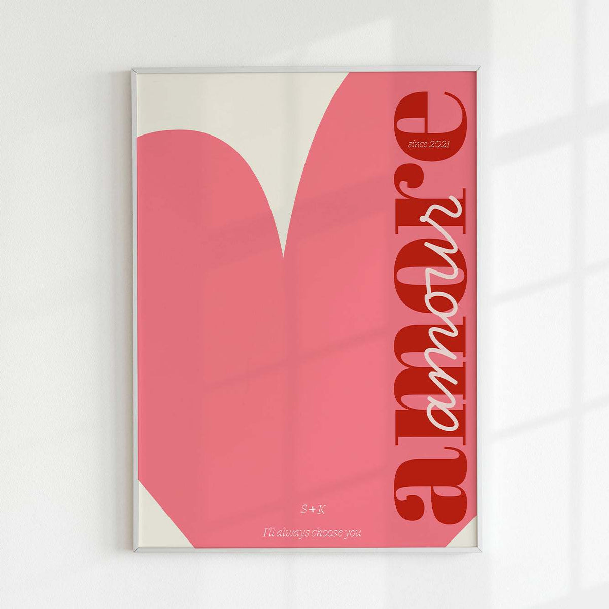 Personalized Valentine’s Day print with “amore” and “amour” word, modern artistic typography on pink background, customizable initials, date, inscription, and colors, unique romantic couple gift.