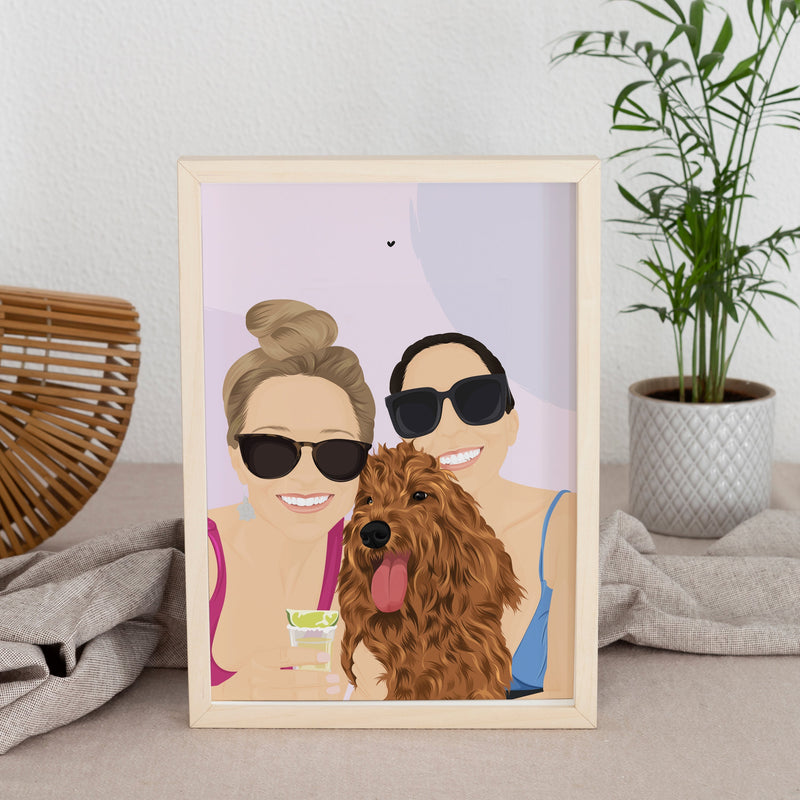 Custom digital illustration of two women smiling with their brown golden doodle dog. The portrait is framed in a light wood frame, creating the perfect gift for a family with a pet or a unique housewarming keepsake.