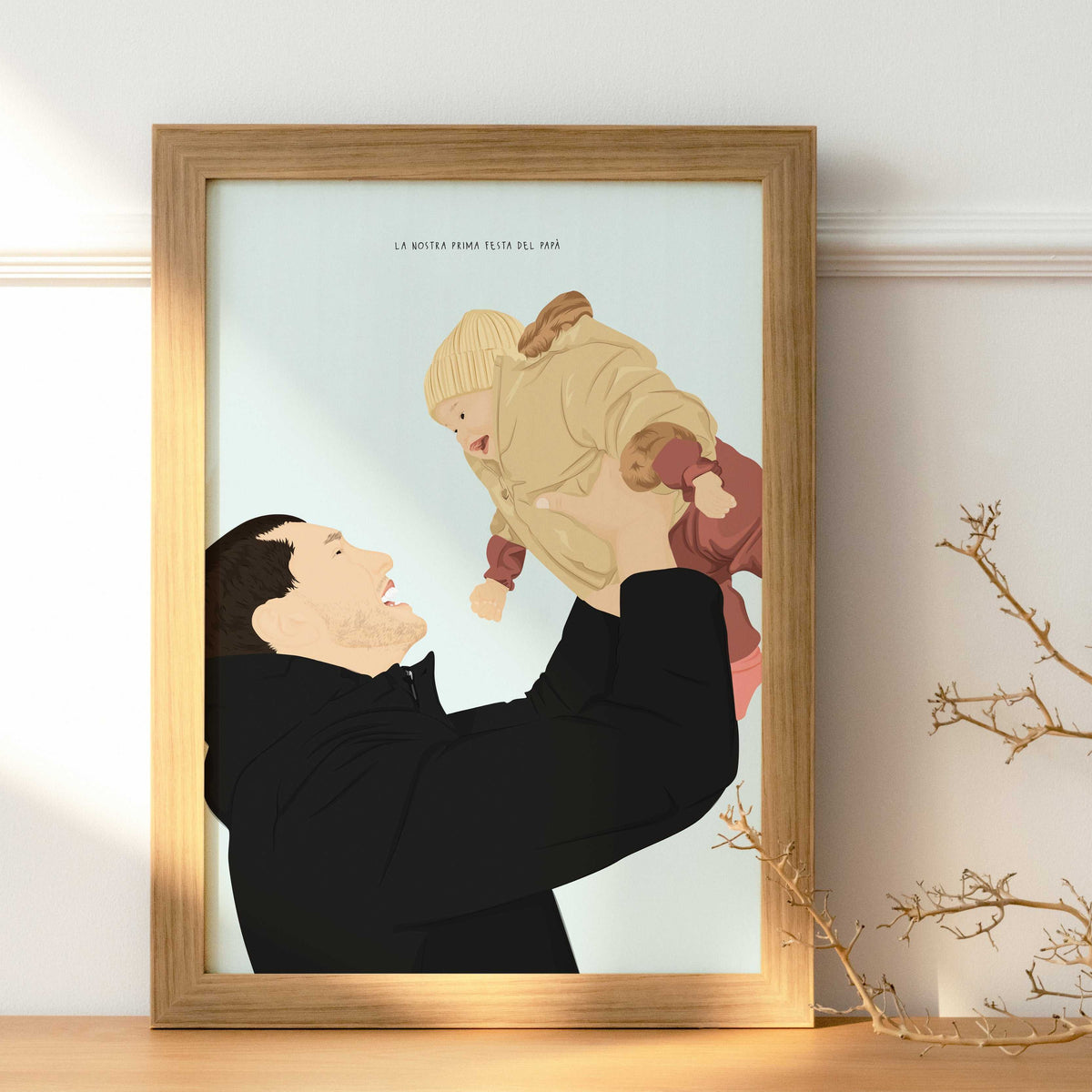 A realistic custom digital portrait based on a photo, featuring a father lifting his baby high in the air. The artwork captures detailed silhouettes and clothing textures, with the father in a black hoodie and the baby in a quilted beige snowsuit and knit beanie.