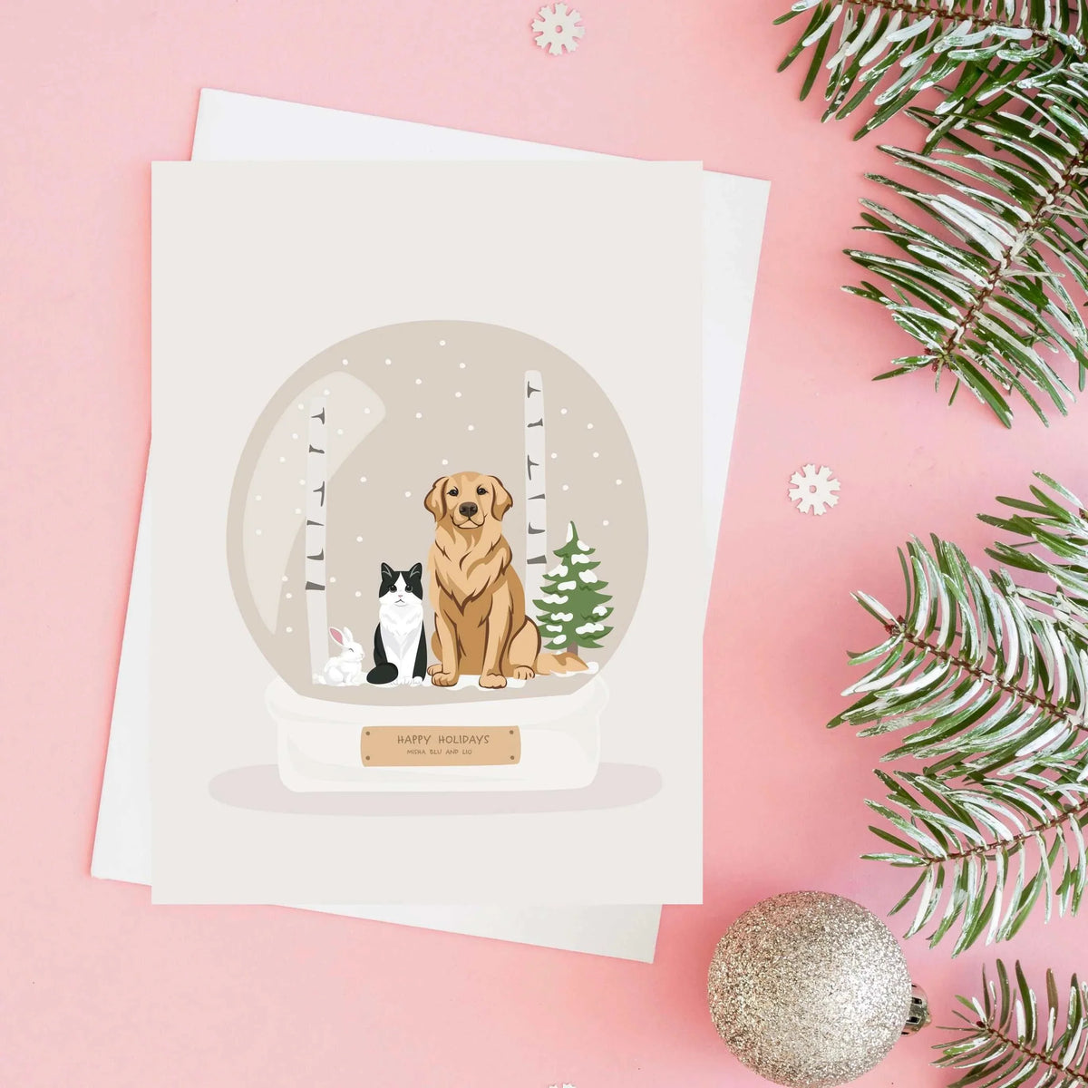 Personalized Pet Portrait for Christmas Card featuring a custom hand-drawn illustration of a Golden Retriever, tuxedo cat, and rabbit inside a festive winter snow globe.