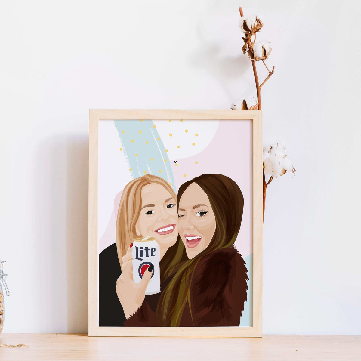 Personalized best friend portrait from photo in a light wood frame, featuring a hand-drawn digital illustration of two women laughing, holding a cocktails, with an aesthetic abstract background, perfect for roommate apartment decor.