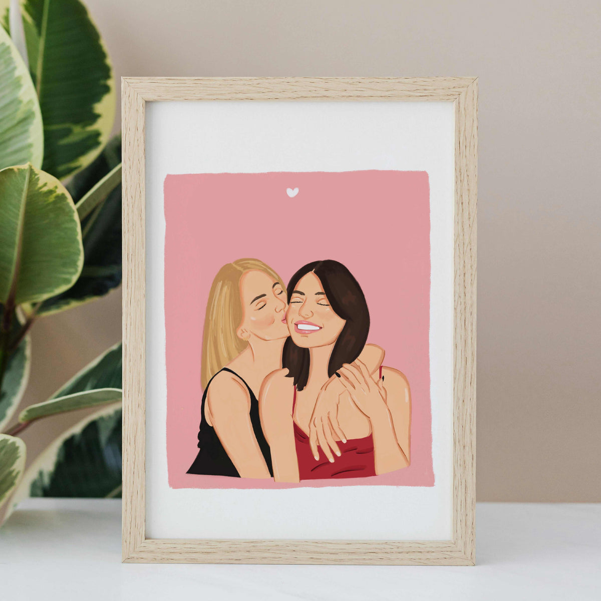 Personalized birthday gift from friends featuring a custom digital group illustration. Hand-drawn portrait of two women shown in a modern wooden frame, perfect as a bridesmaid proposal or a touching keepsake for a bachelorette party, meticulously drawn from separate reference photos.