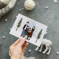 A personalized family portrait for Christmas cards printed as a custom holiday card, depicting a detailed hand-drawn illustration of a family of five, including children and a baby, celebrating together in a snowy landscape. A personalized Holiday Greeting Card.