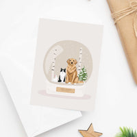 Personalized Pet Portrait for Christmas Card displaying a unique hand-drawn holiday illustration of a dog, cat, and bunny inside a snow globe.