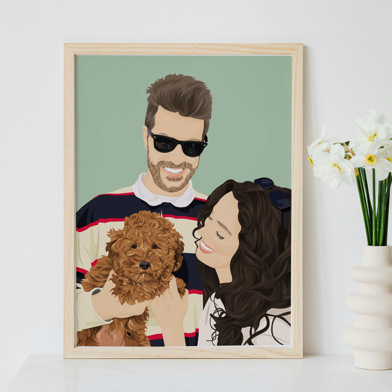 A personalized family with pet portrait illustration of a couple smiling with their brown poodle puppy, showcased in a light wood poster frame next to a flower vase as a lovely wedding or anniversary gift.