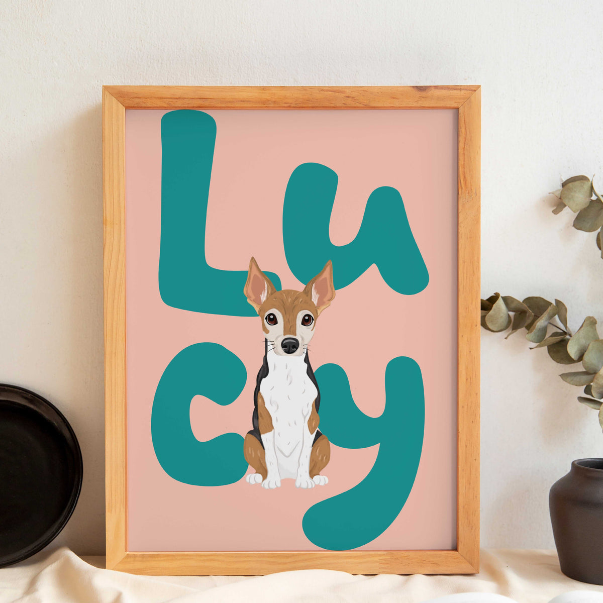 Personalized pet portrait print featuring a hand-drawn illustration of a dog with the name “Lucy” in bold modern lettering, pastel pink background, minimalist style wall art, unique custom gift for dog lovers and pet owners.